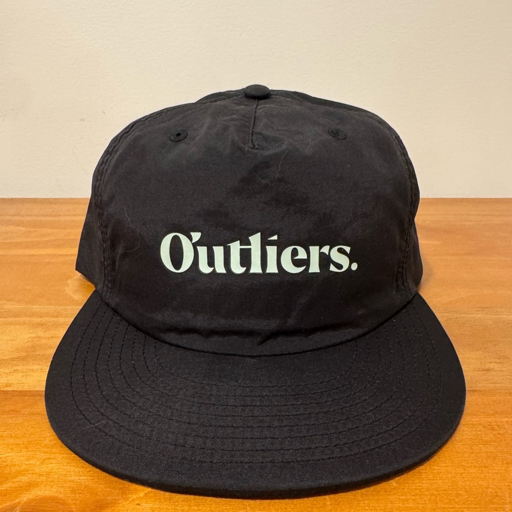 NWOT Black “Outliers” Golf Men's Adjustable Hat